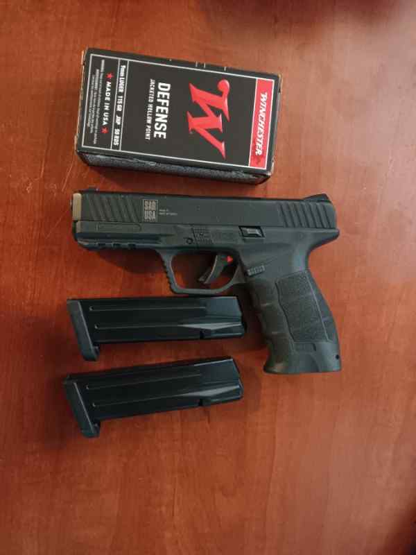 Sar 9 pistol with 2 mags